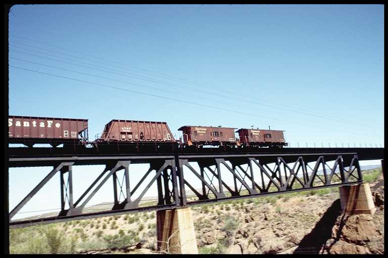 Rear of Train, Two Cabooses on High Bridge
