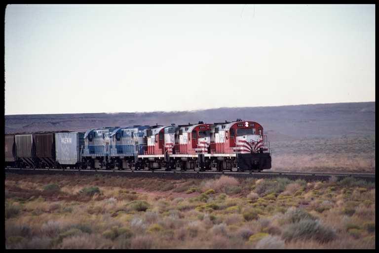 Freight Train at Speed Across High Desert