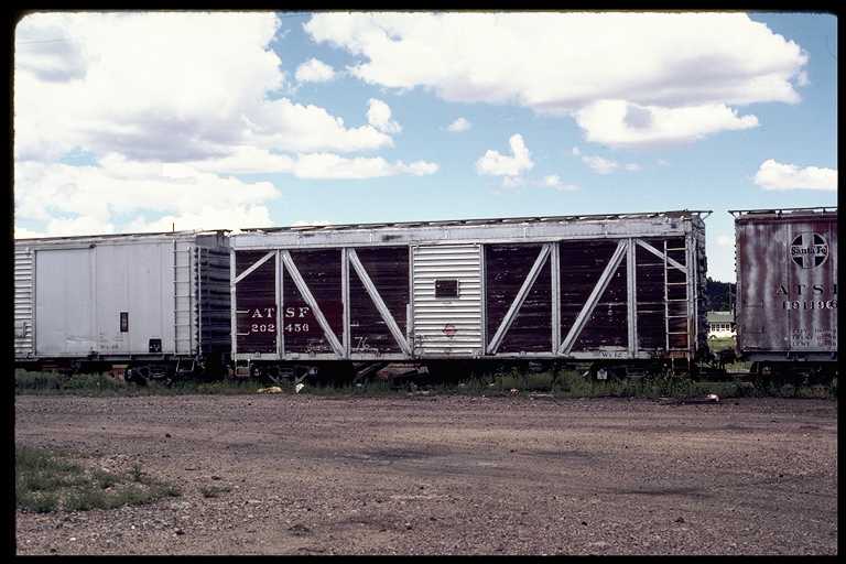 Outside Braced Wood Boxcar #202456 in Mow Service