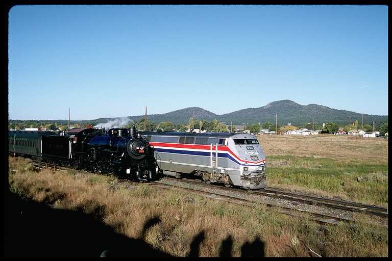 Modern Amtrak Engine Passing Steam Engine #4960