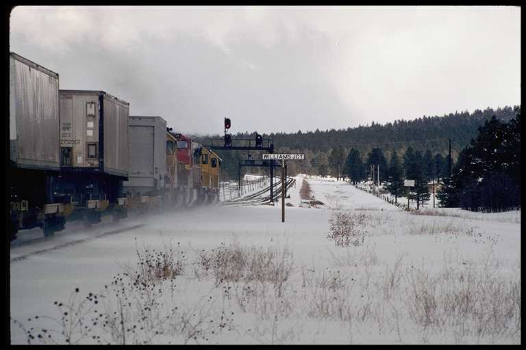 East bound train kicking up snow at Williams Junction.  Loacation where ATSF line to Phoenix (Peavine) splits from mainline.
