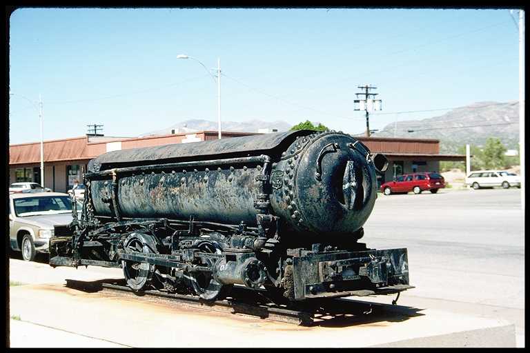 Compressed air locomotive on display at Kearny, AZ.  Used in underground mine.
