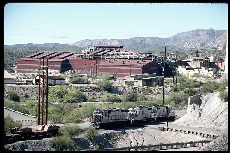 Copper Basin engines picking up cars from ASARCO smelter.