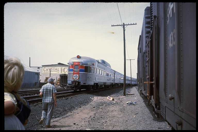 Photo of American Freedom Train with dome/observation car on rear.