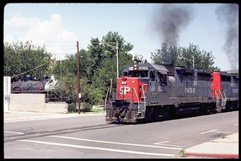 6318 Street Running with Steam Engine in Background