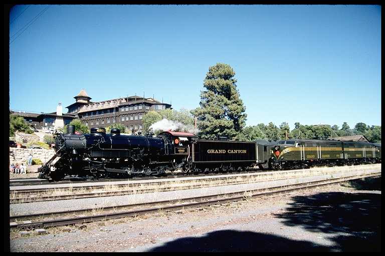 GCRY #4960 Preparing to Depart. El Tovar Hotel, Built by Fred Harvey and SF RR in Background.