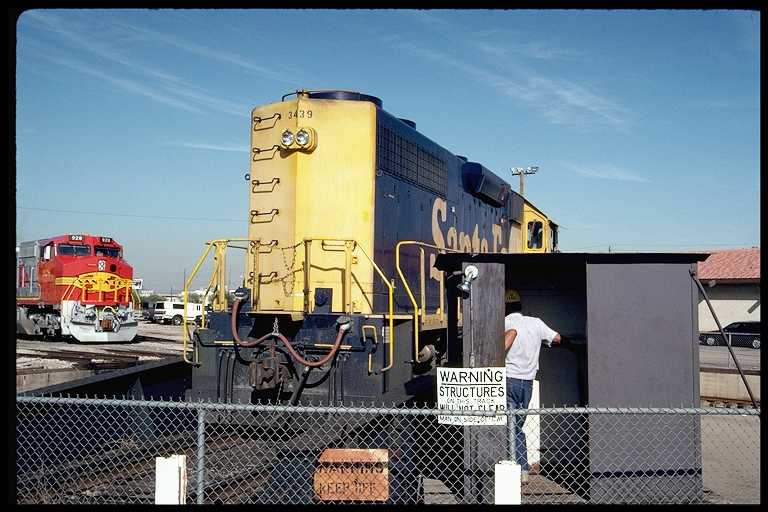 Engine benig turned on locomotive turntable.
