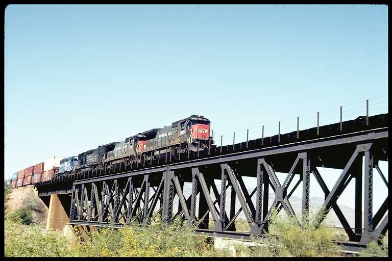 West bound train crossing bridge at Vail.